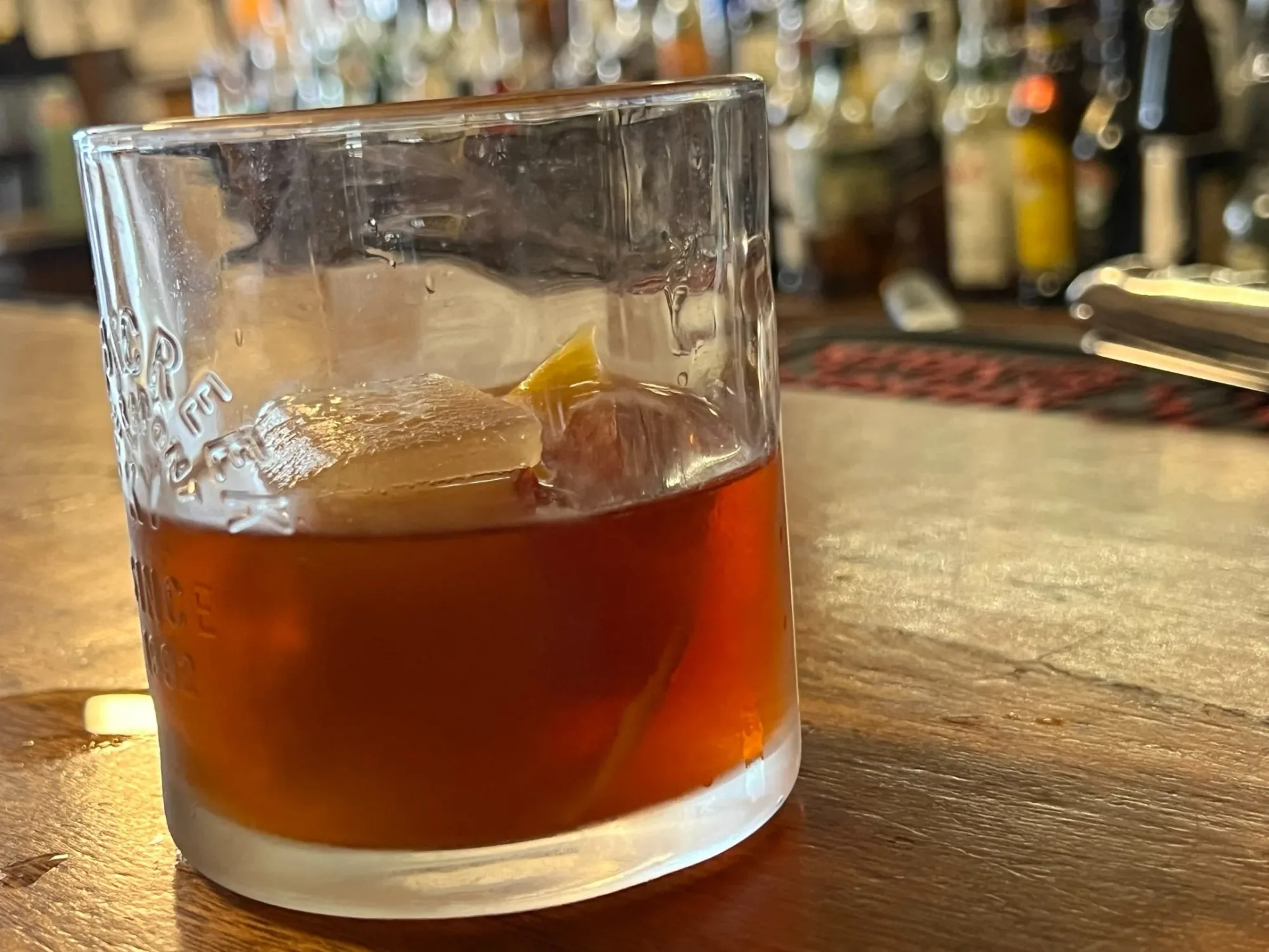 Cocktail in a rocks glass on the bar