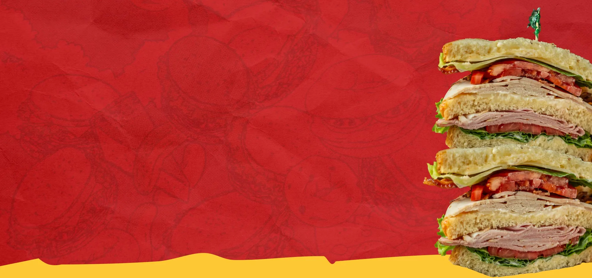 Stack of deli sandwich halves on a red background