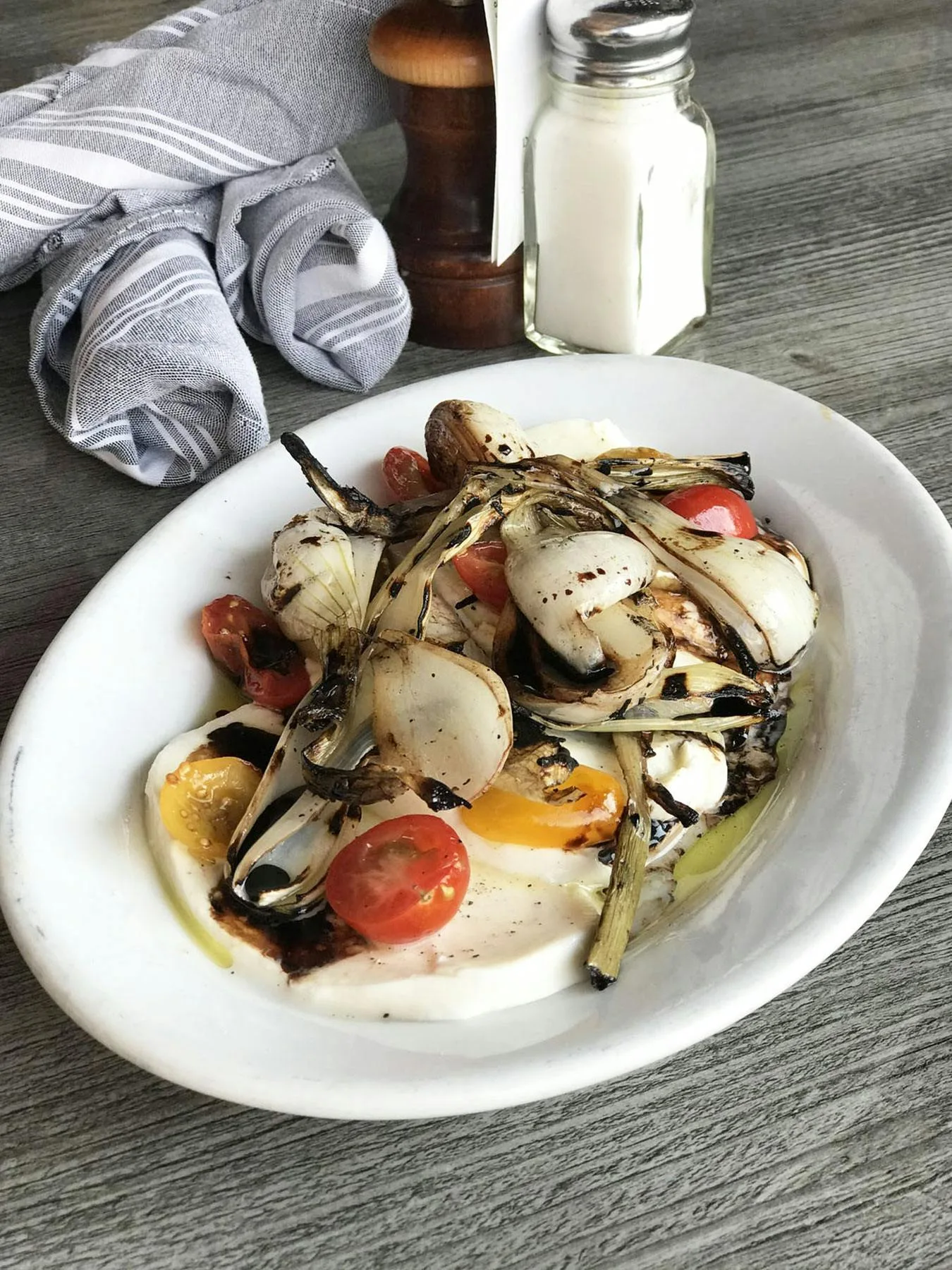 Plate of roasted vegetables and mushrooms