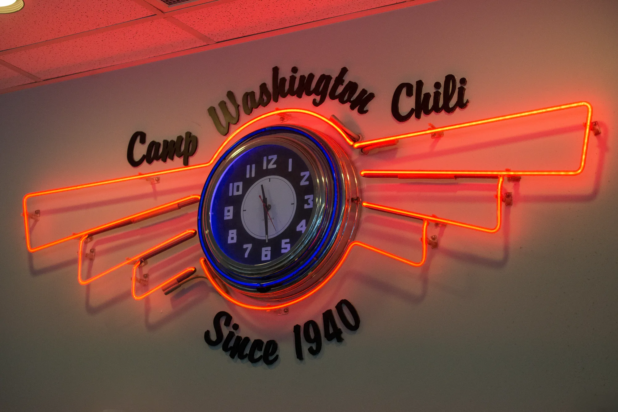 Neon Camp Washington Chili clock sign reading Since 1940