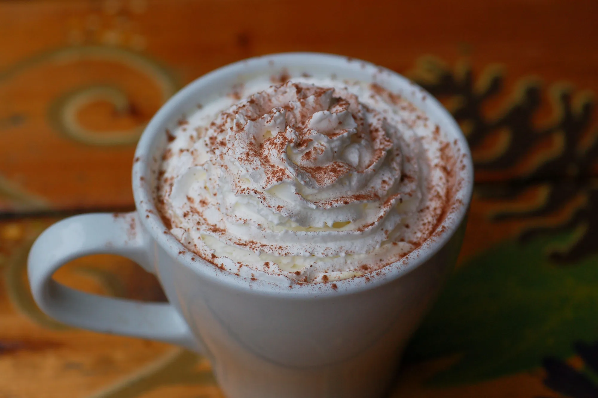 Cup of coffee with whipped topping